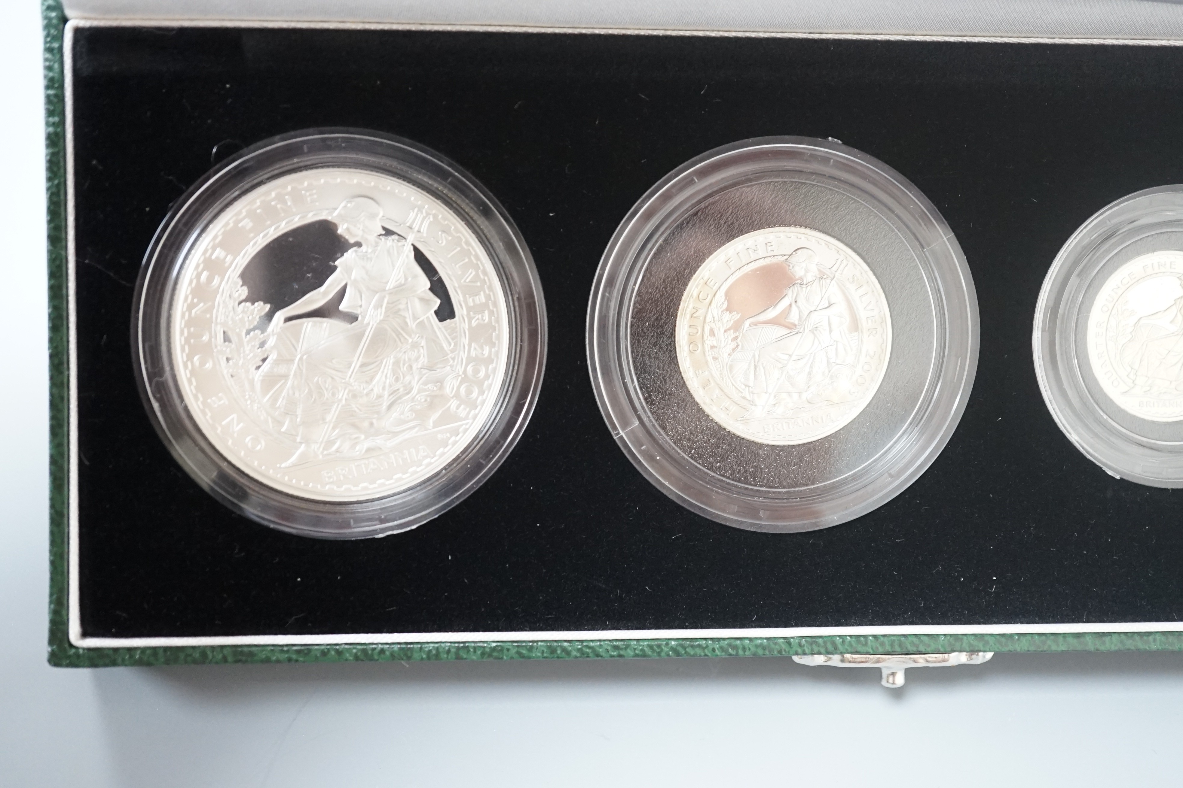 Two cased Royal Mint Britannia silver proof four coin sets, 2005 and 2008, 20p to £2
